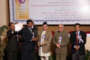 MD-recieving-award-from-Dy.-PM-of-Nepal